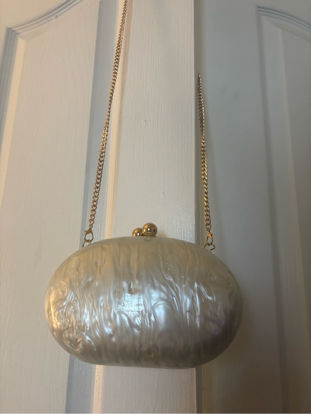 a new day Iridescent Ivory Pearlized Clutch with Gold Chain